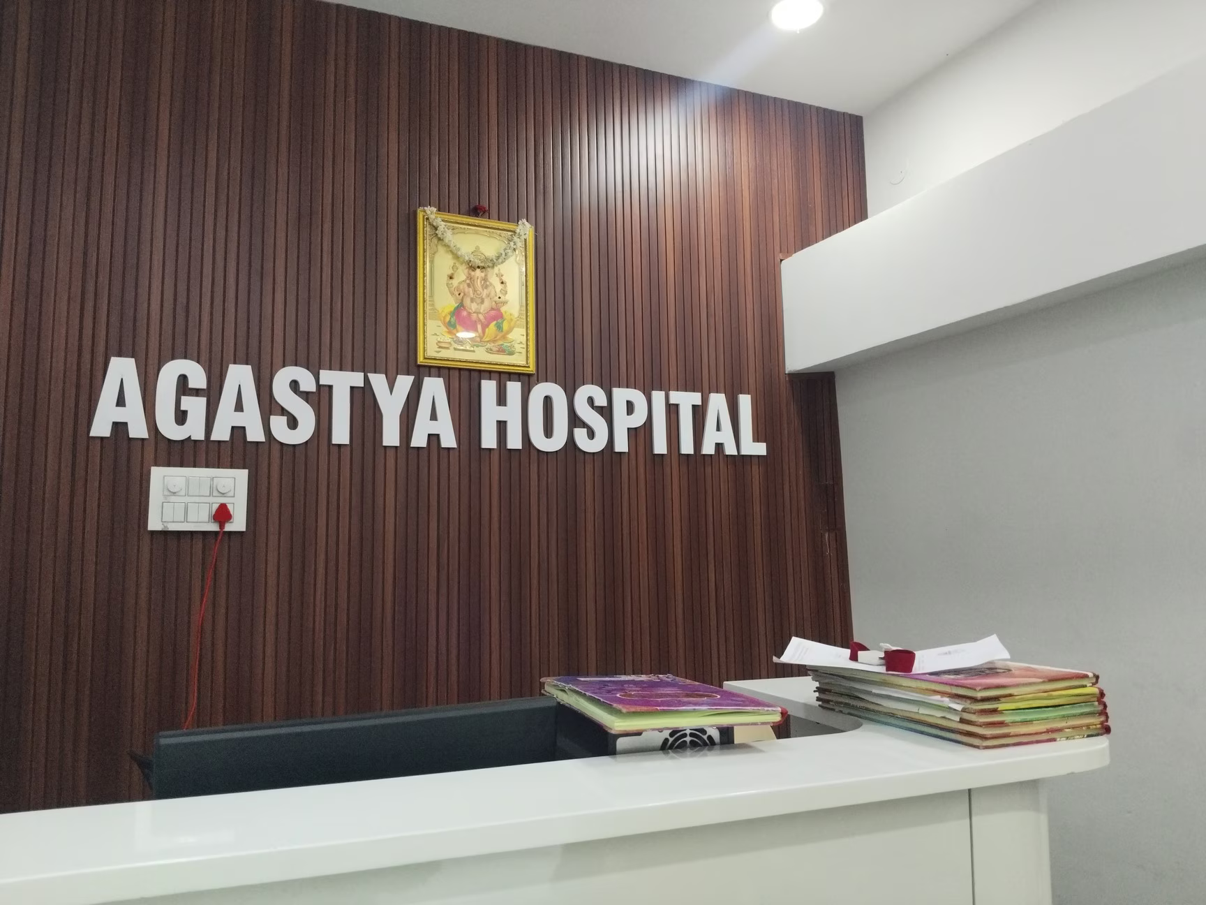 Dr Agastya consulting patient